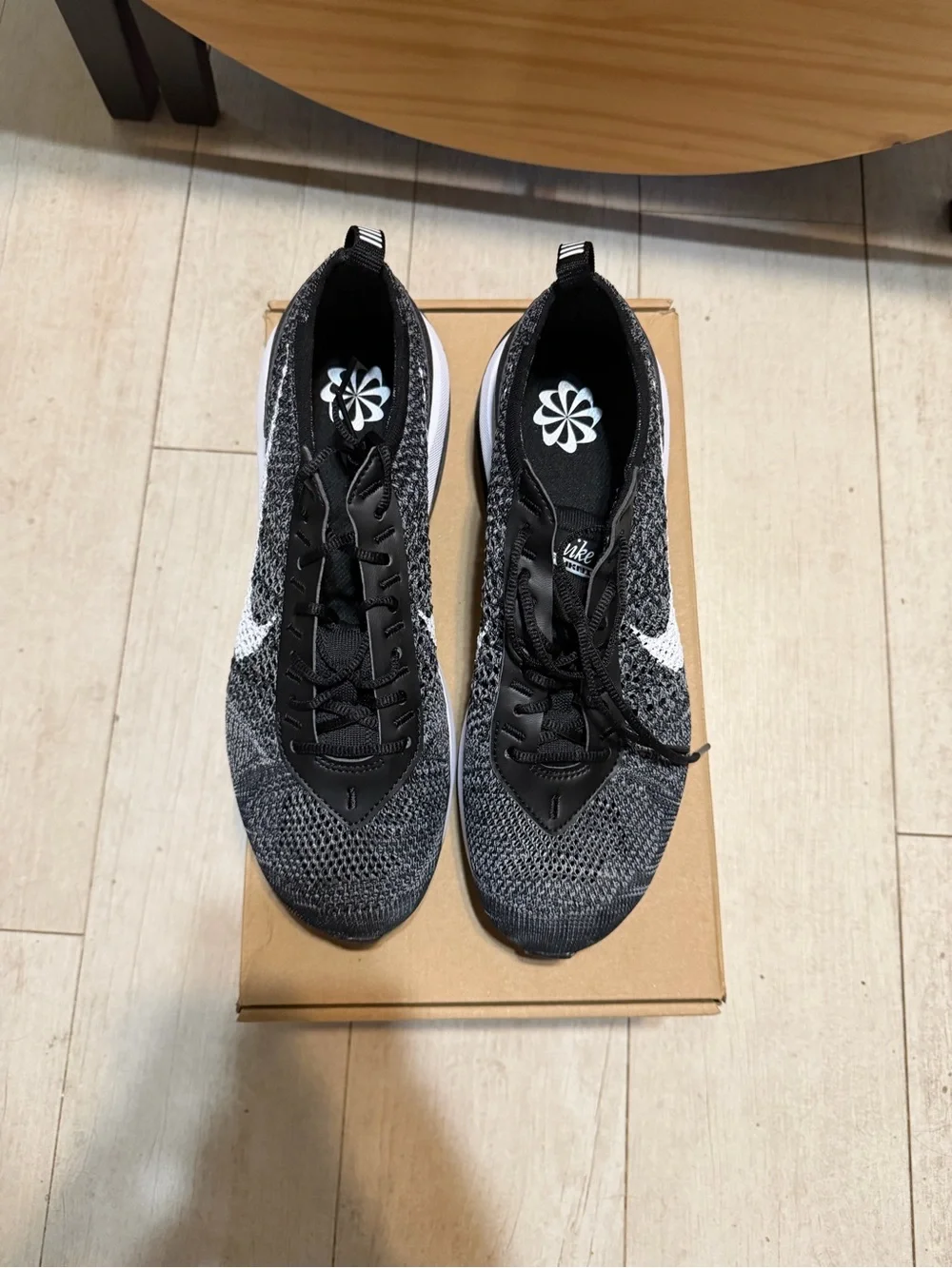 Nike Flyknit Racer Women’s Athletic Sneakers - Black/White